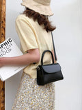 Slingo Small Clutch